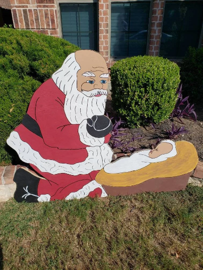 Kneeling Santa and Baby Jesus Yard Art