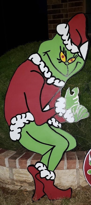 Stealing Grinch Yard Art